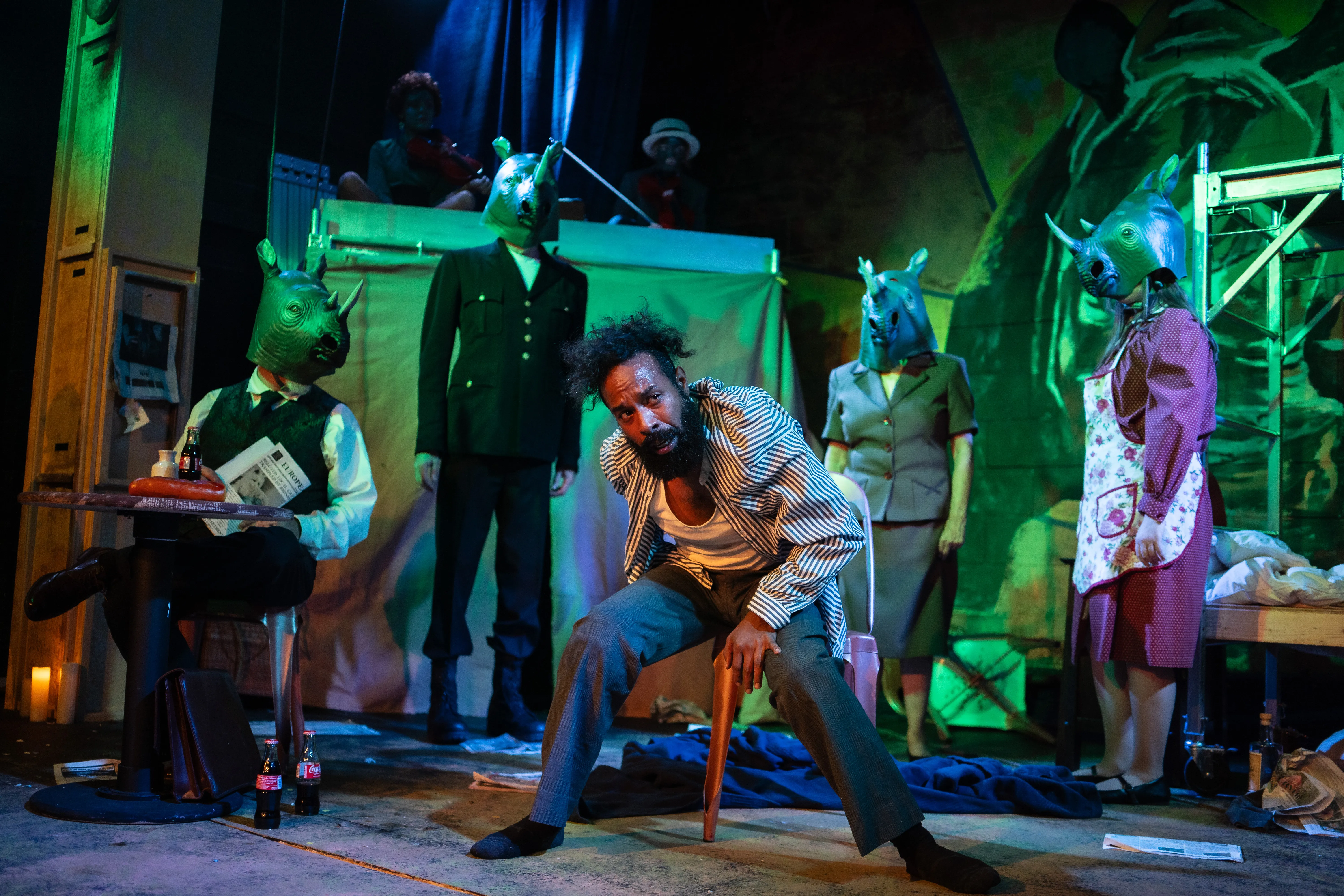 'Rhinoceros' at Limelight Theatre Blurs the Line Between Audience and Herd logo